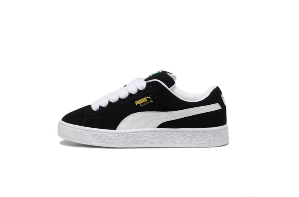 PUMA Suede XL Sneakers in Black and White - product image from the listing.