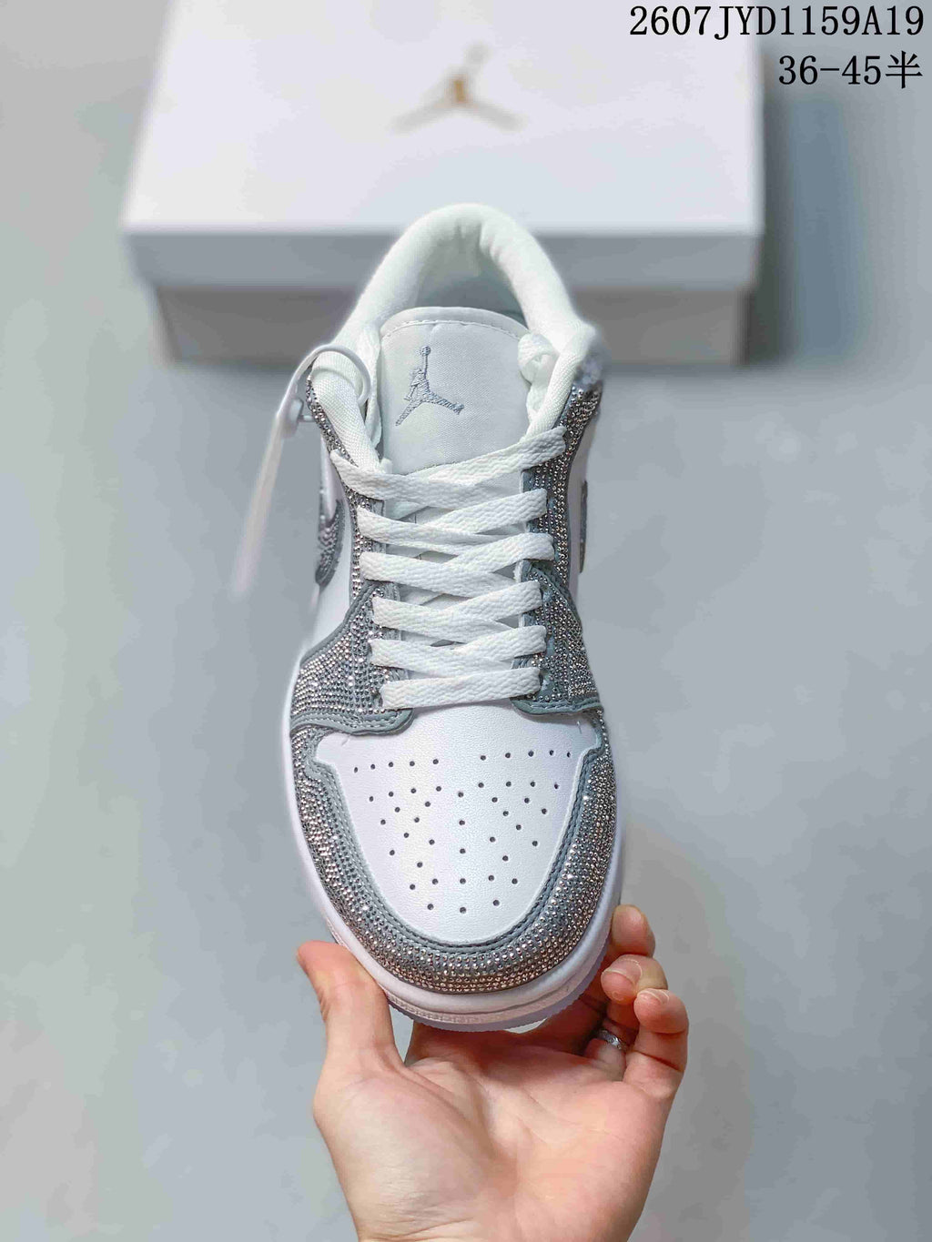 Air Jordan 1 Low Sneakers White Silver 2607JYD1159A19 - product image from the listing.