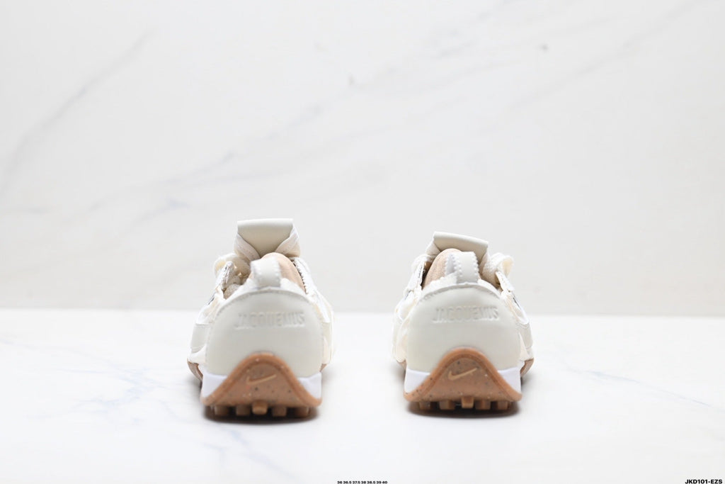 White Jacquemus x Nike Jacumoon Sneakers - product image from the listing.