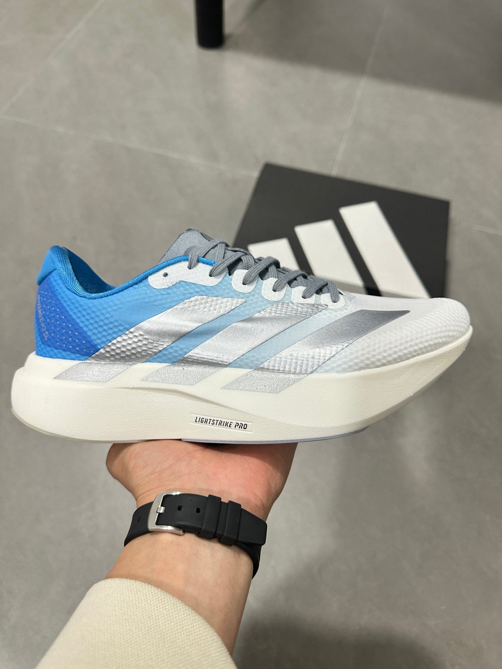 adidas Adizero EVO SL Running Shoes in White Blue JR2027 - product image from the listing.