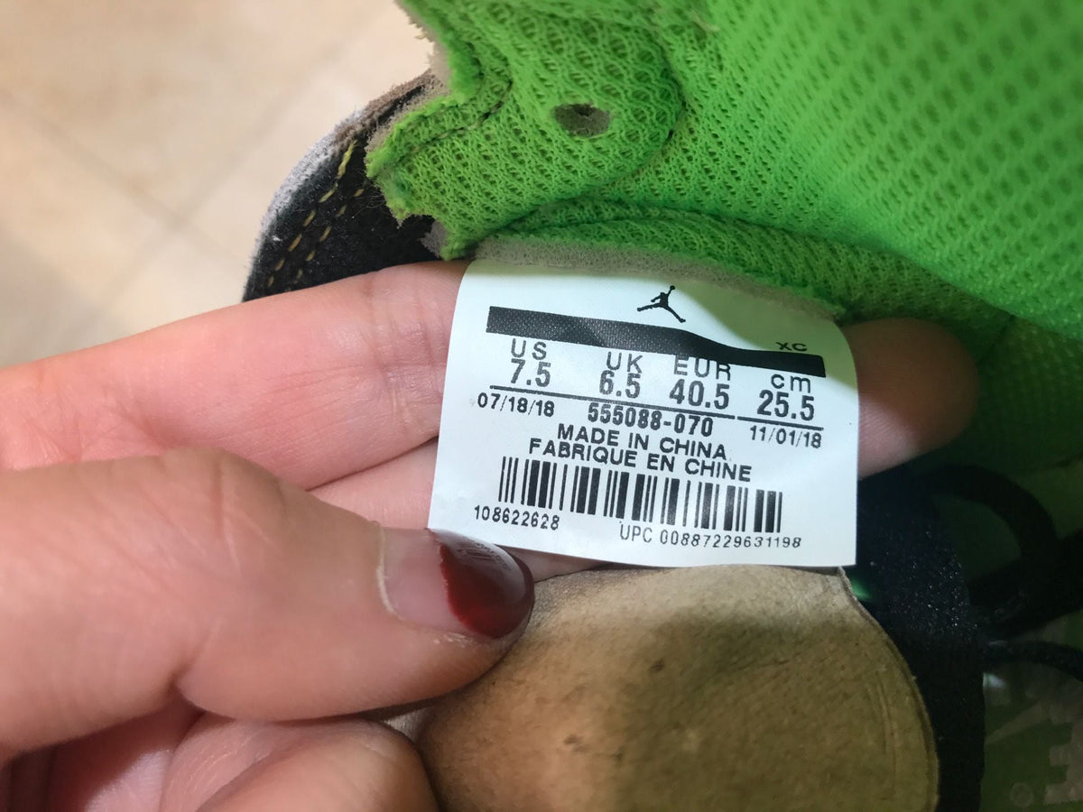 Jordan 1 Retro High OG High-Top Sneakers in Grey Green - product image from the listing.
