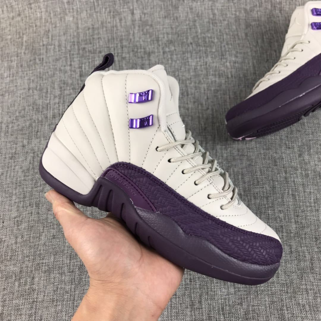 Air Jordan 12 White Purple Sneakers 510815-001 - product image from the listing.