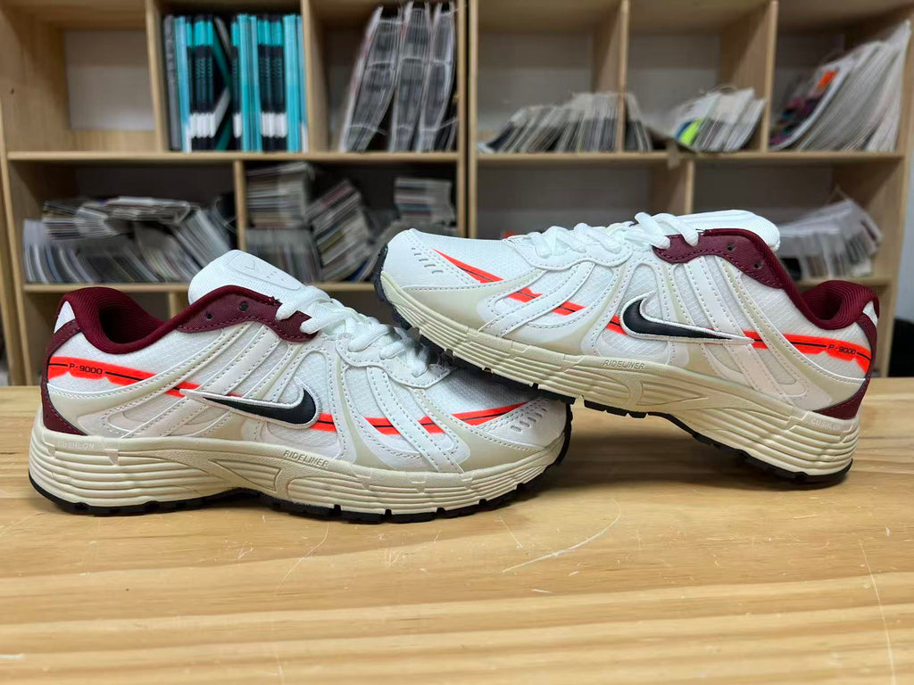 Nike P-9000 Sneakers in White and Burgundy IZ4751-100 - product image from the listing.