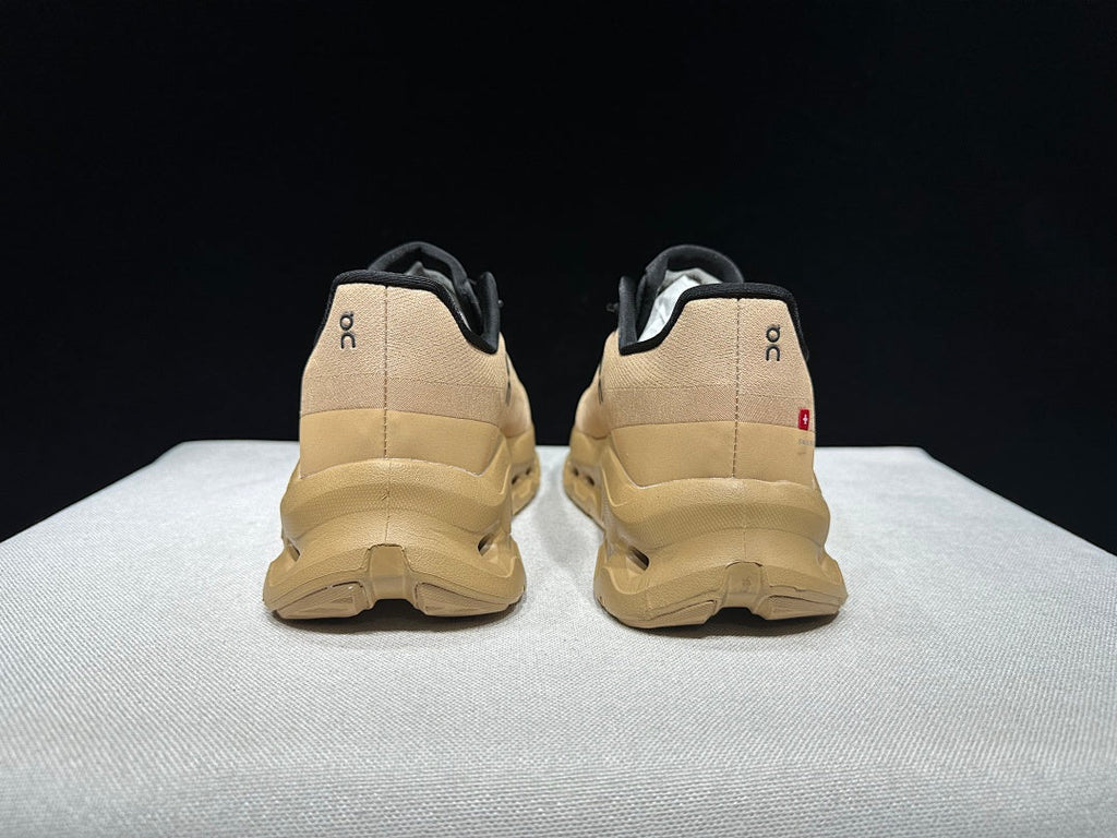 Brown and Black On Cloudtilt Sneakers - product image from the listing.