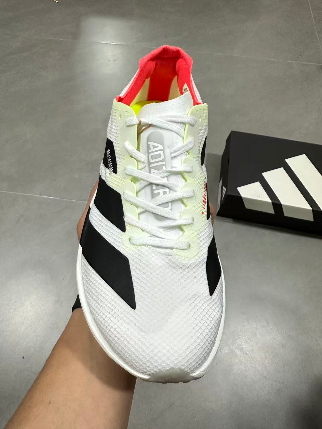 Adidas Adizero Lightstrike Pro Running Shoes in White Black - product image from the listing.