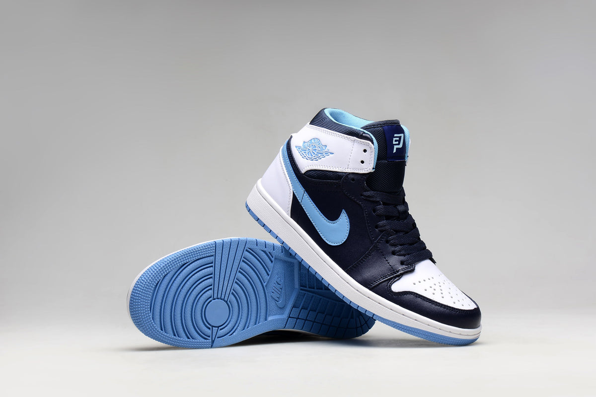 Blue and White Jordan 1 High Paul Edition Navy Sneakers - product image from the listing.