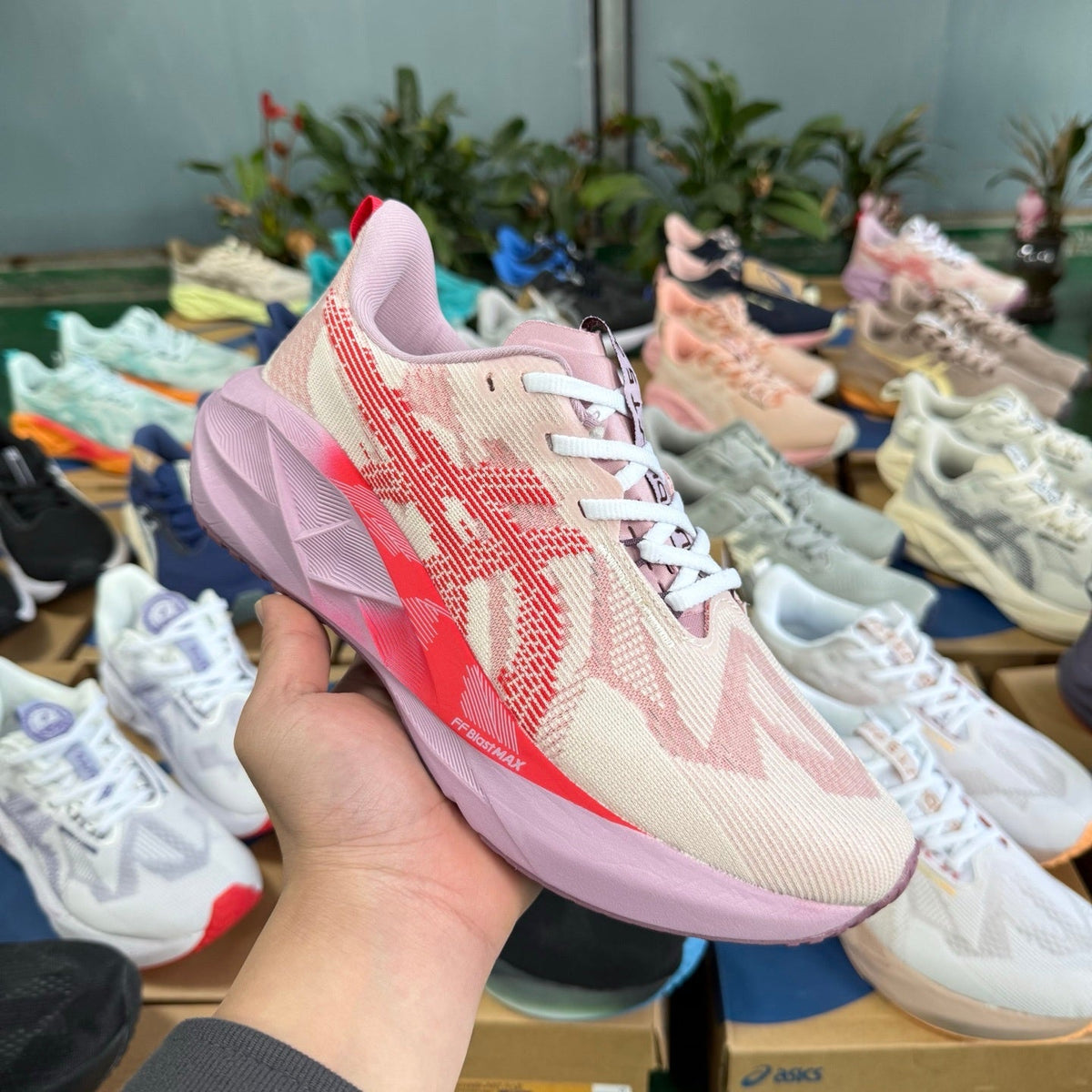 ASICS NOVABLAST 5 LE Running Shoes in Pink and Orange - product image from the listing.