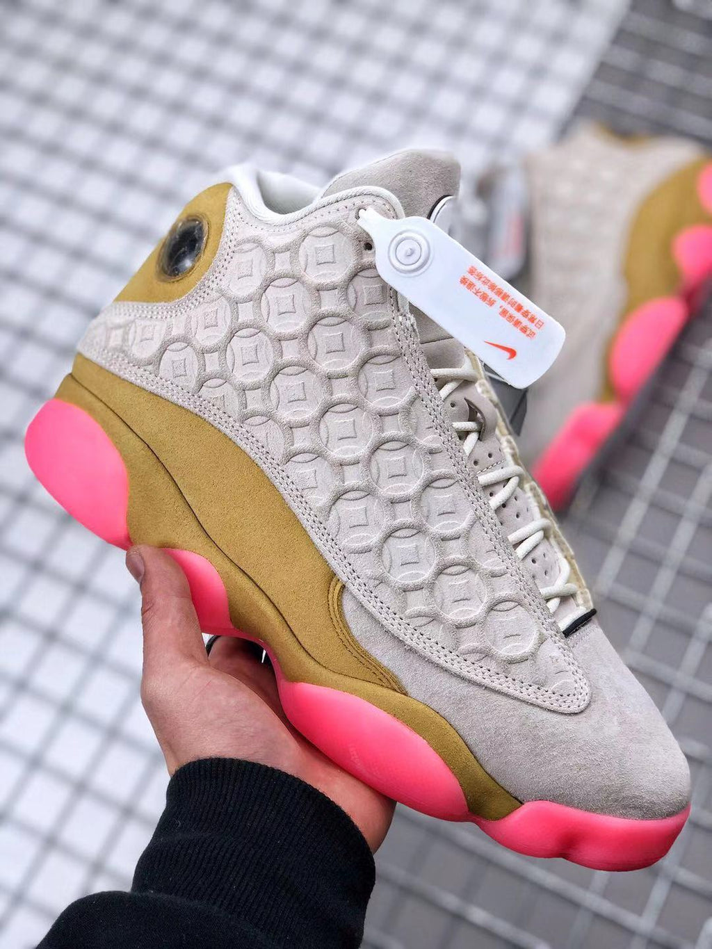 Air Jordan 13 CNY Sneakers in White, in Gold and Pink - product image from the listing.