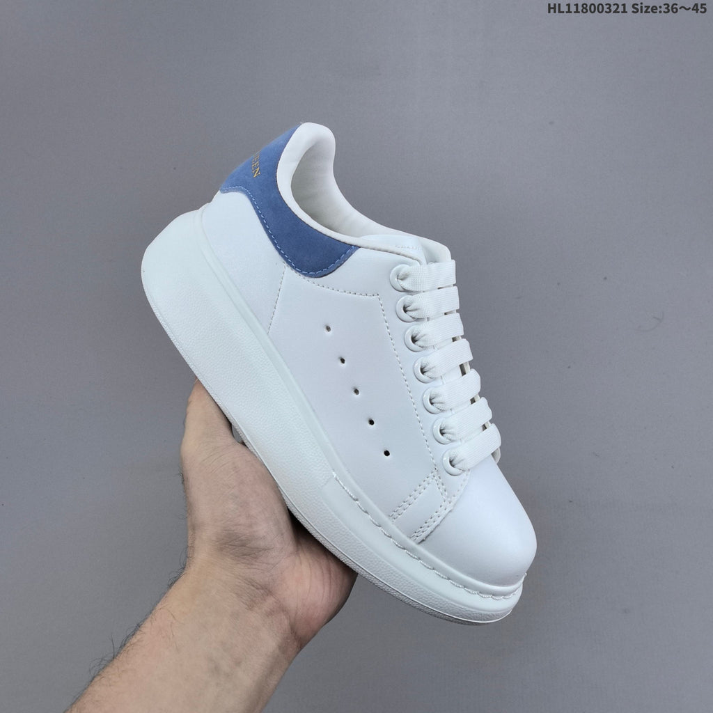 Alexander McQueen Oversized Low-Top Sneakers, in White and Blue - product image from the listing.