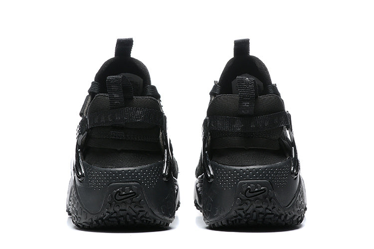 Nike Air Huarache Sneakers in Black - product image from the listing.