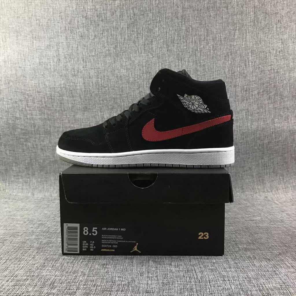 Jordan 1 Mid Sneakers in Black Red Blue 554724-065 - product image from the listing.