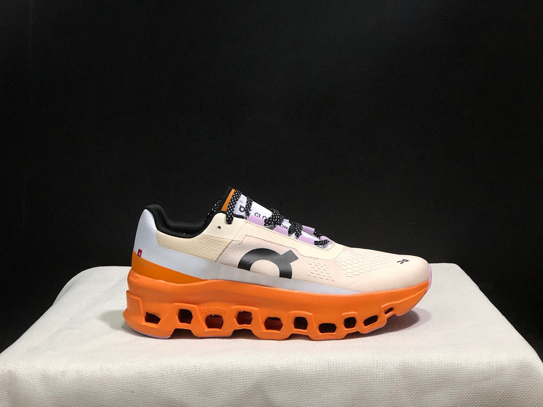 Yellow Tan and Orange On Cloudmonster Running Shoes - product image from the listing.