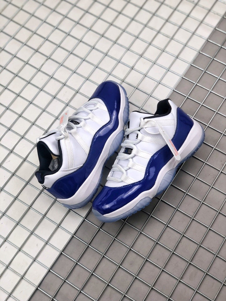 Air Jordan 11 Sneakers in White and Deep Blue BQ3685-001 - product image from the listing.