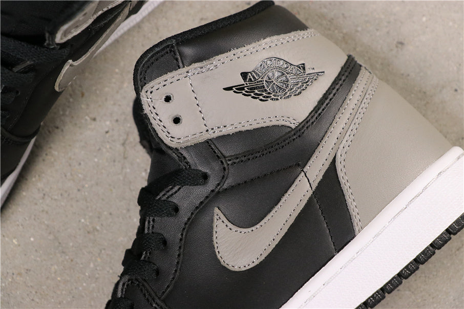 Air Jordan 1 High Shadow in Black Grey White 555088-013 - product image from the listing.