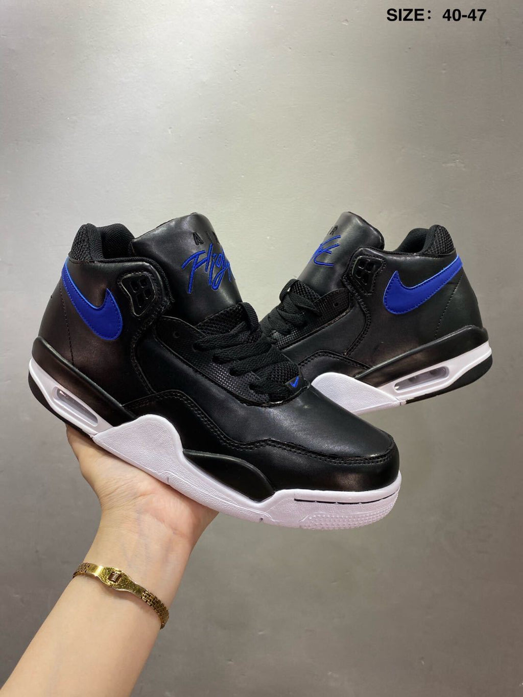 Nike Air Flight 89 Sneakers in Black and Royal Blue - product image from the listing.