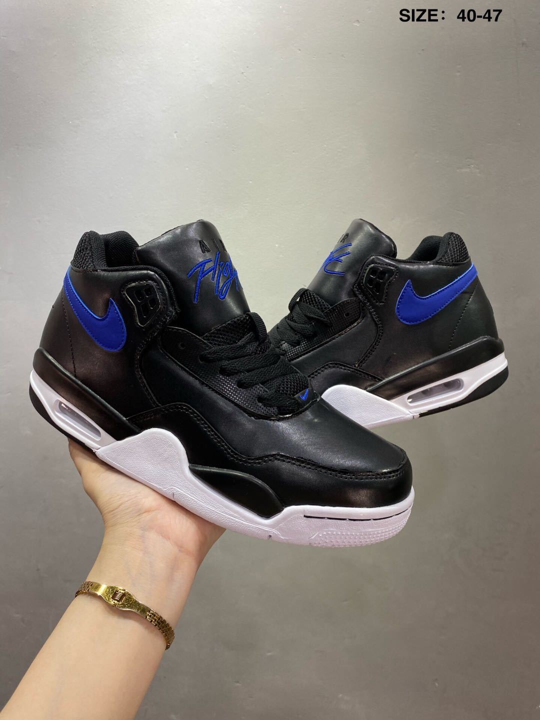 Nike Air Flight 89 Sneakers in Black and Royal Blue - product image from the listing.