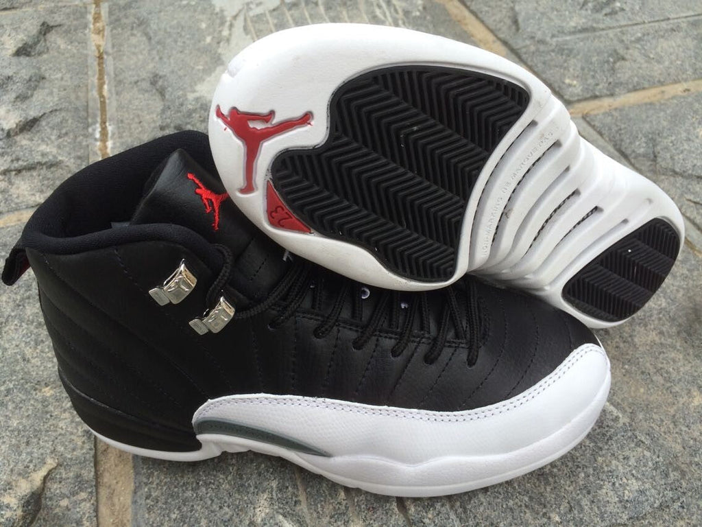 Women's Air Jordan 12 High-Top Sneakers, Black and White - product image from the listing.