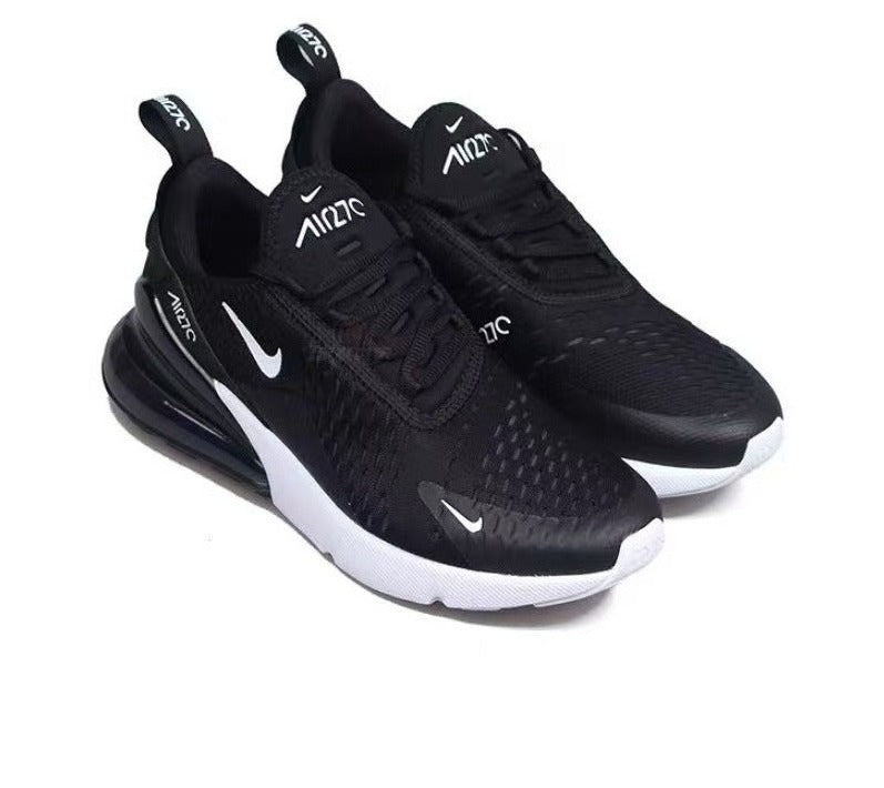 Nike Air Zoom Sneaker in Black and White - product image from the listing.