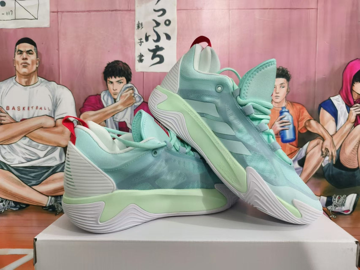 Mint Green and White Basketball Sneakers - product image from the listing.