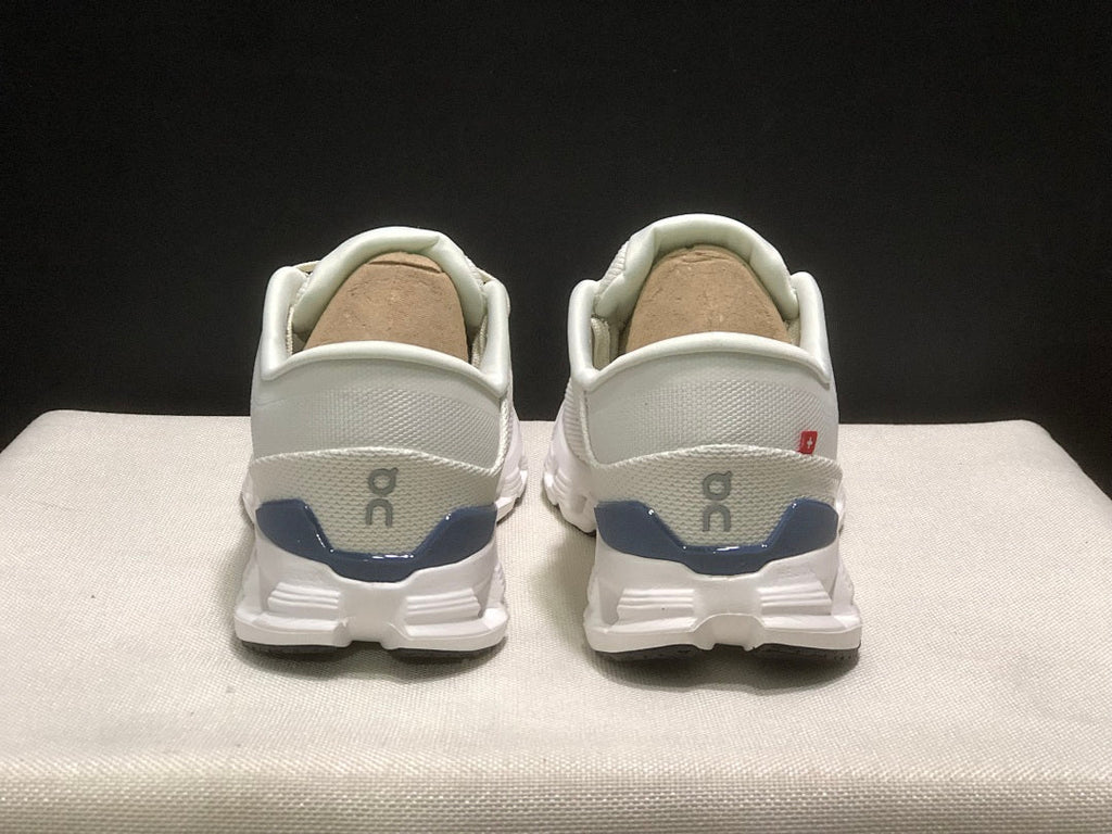 On Cloud X 4 Sneakers in Ivory and Blue - product image from the listing.