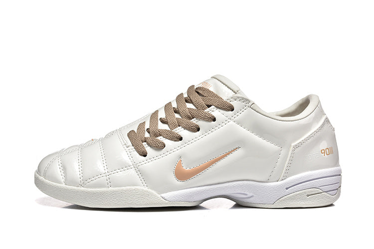 Nike Tiempo 90 Sneakers in White and Pale Yellow - product image from the listing.