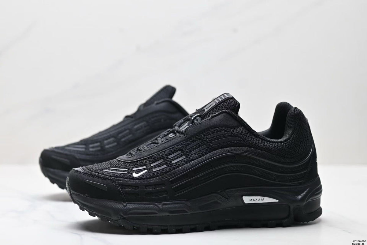 Nike Air Max Plus x Comme des Garçons Sneakers in Black - product image from the listing.