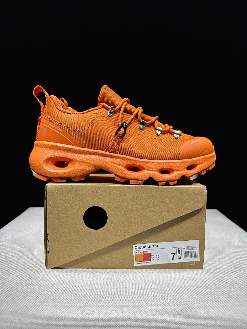 On x Loewe Cloudsurfer Orange Trail Trainers - product image from the listing.