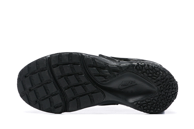 Nike Air Huarache Sneakers in Black - product image from the listing.