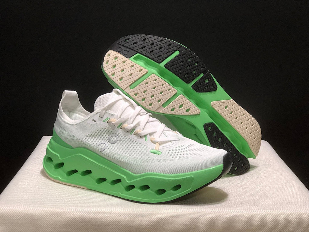 On Cloudsurfer Max Running Shoes in White Green - product image from the listing.