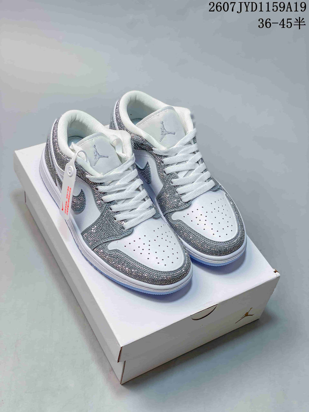Air Jordan 1 Low Sneakers White Silver 2607JYD1159A19 - product image from the listing.