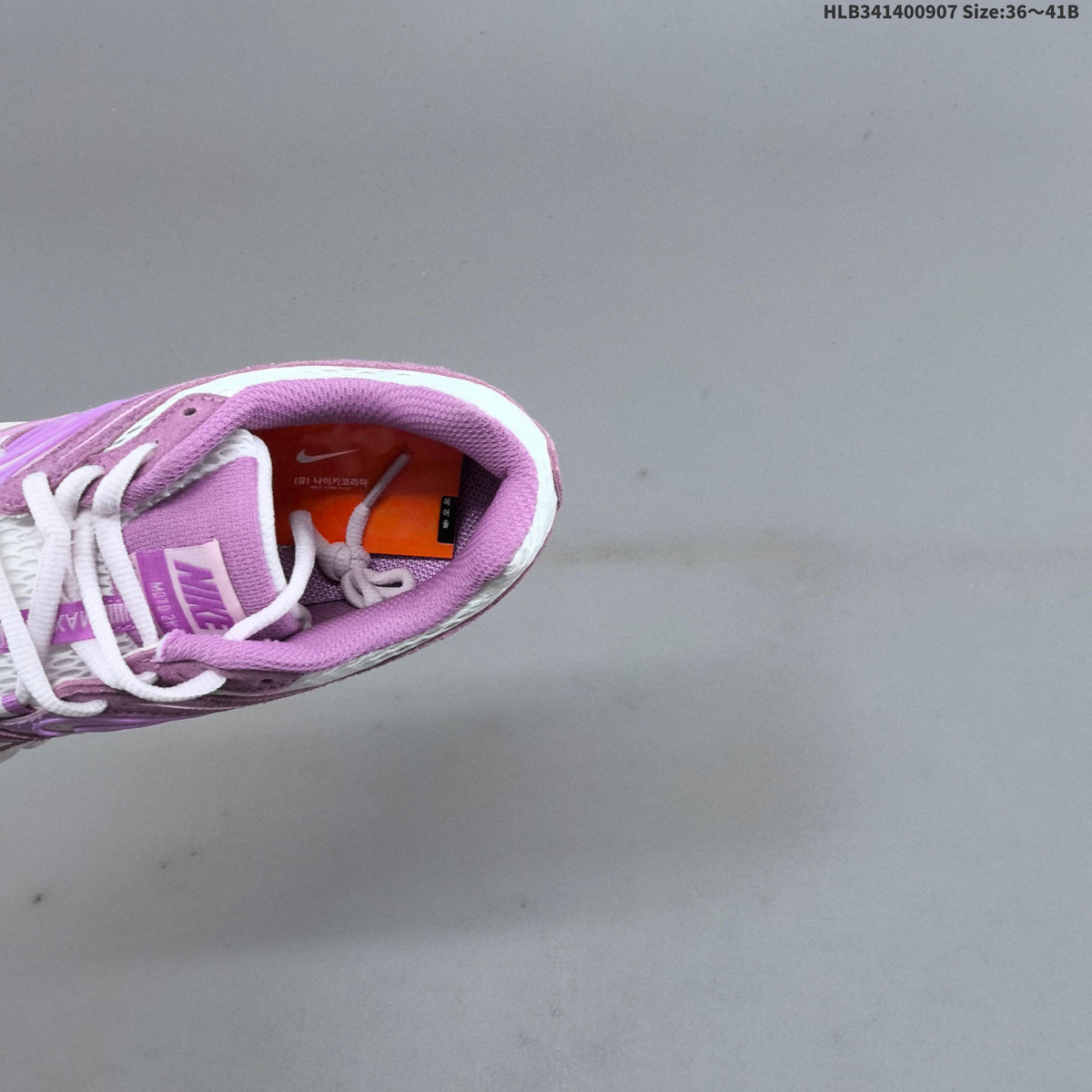 White and Purple Nike Air Max Moto Sneakers - product image from the listing.