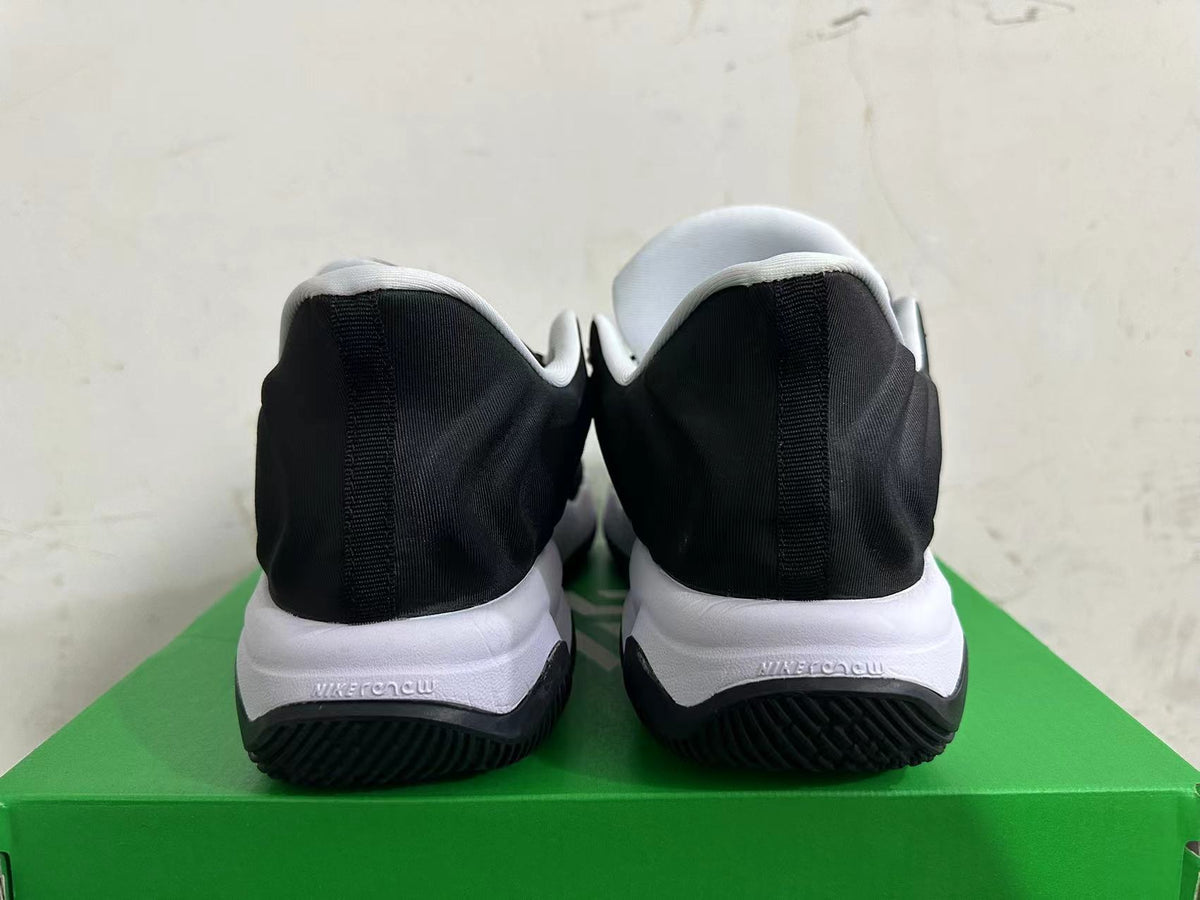 Nike Basketball Sneakers in Black and White - product image from the listing.
