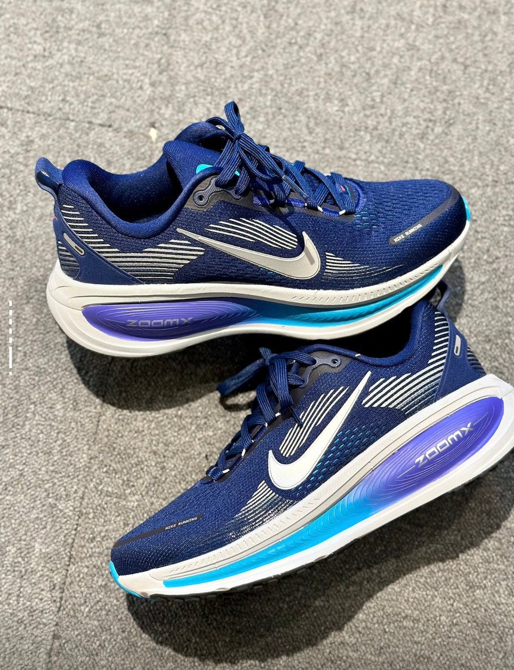 Nike Vomero 18 Running Shoes, in Navy Blue HM6803-401 - product image from the listing.
