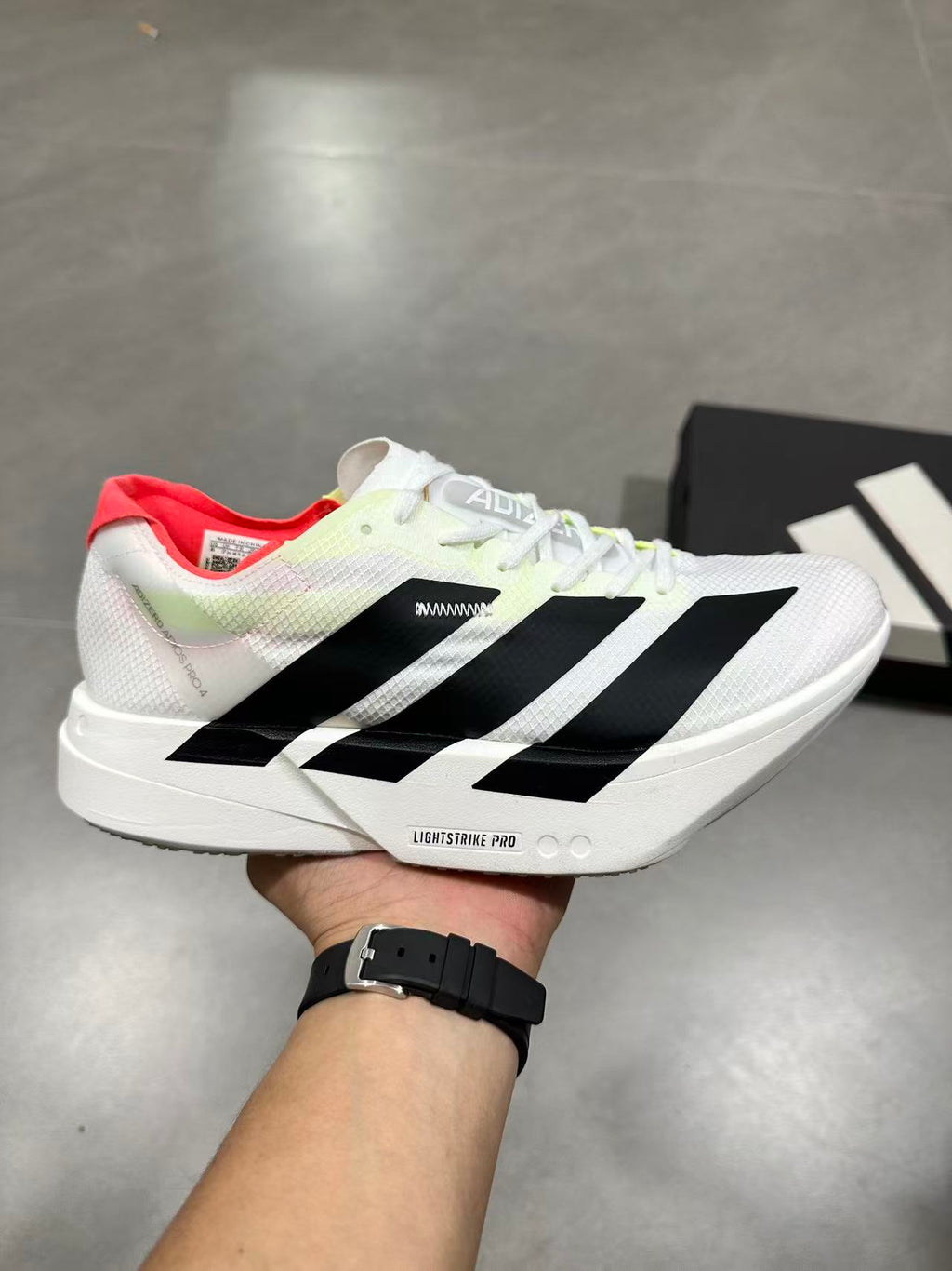 Adidas Adizero Lightstrike Pro Running Shoes in White Black - product image from the listing.
