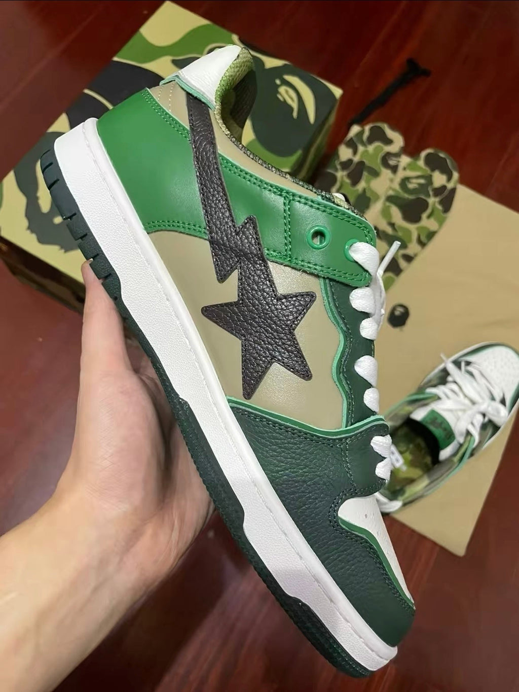 BAPE SK8 STA Low-Cut Sneakers in Green Camo - product image from the listing.