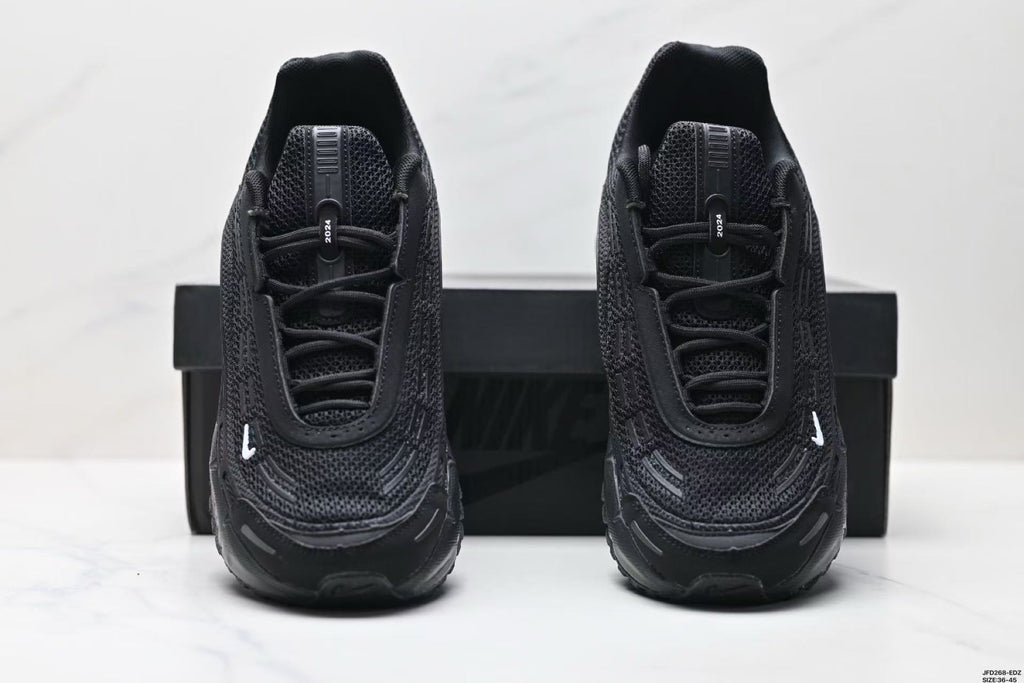 Nike Air Max Plus x Comme des Garçons Sneakers in Black - product image from the listing.