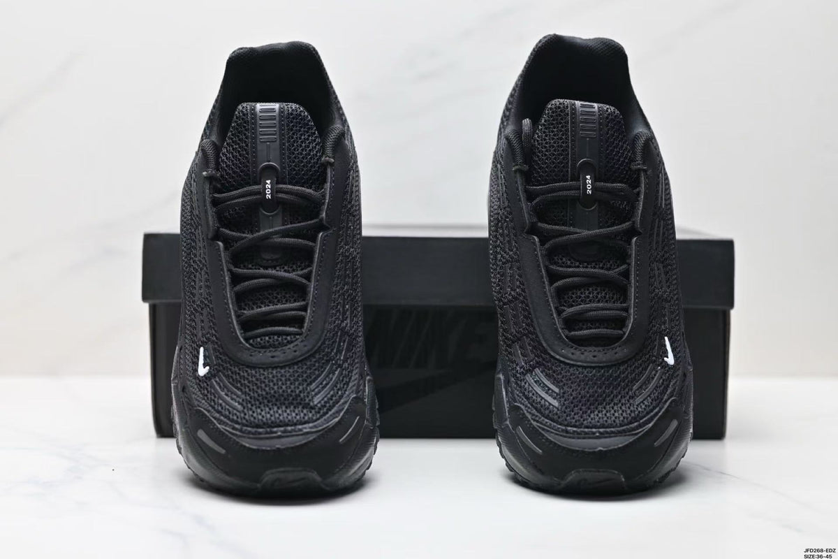 Nike Air Max Plus x Comme des Garçons Sneakers in Black - product image from the listing.