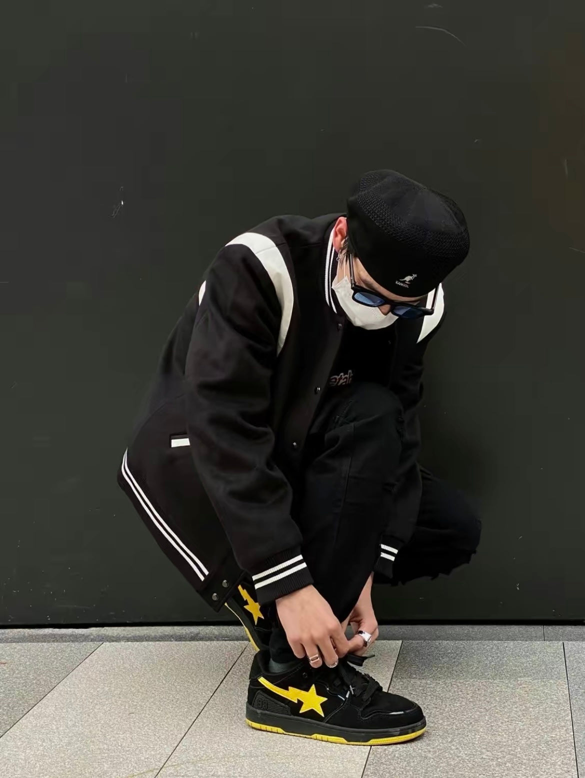 A Bathing Ape SK8 Sta Sneakers in Black Yellow - product image from the listing.