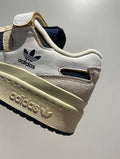adidas Originals Forum 84 Low Sneakers in White Navy GZ6427 - product image from the listing.
