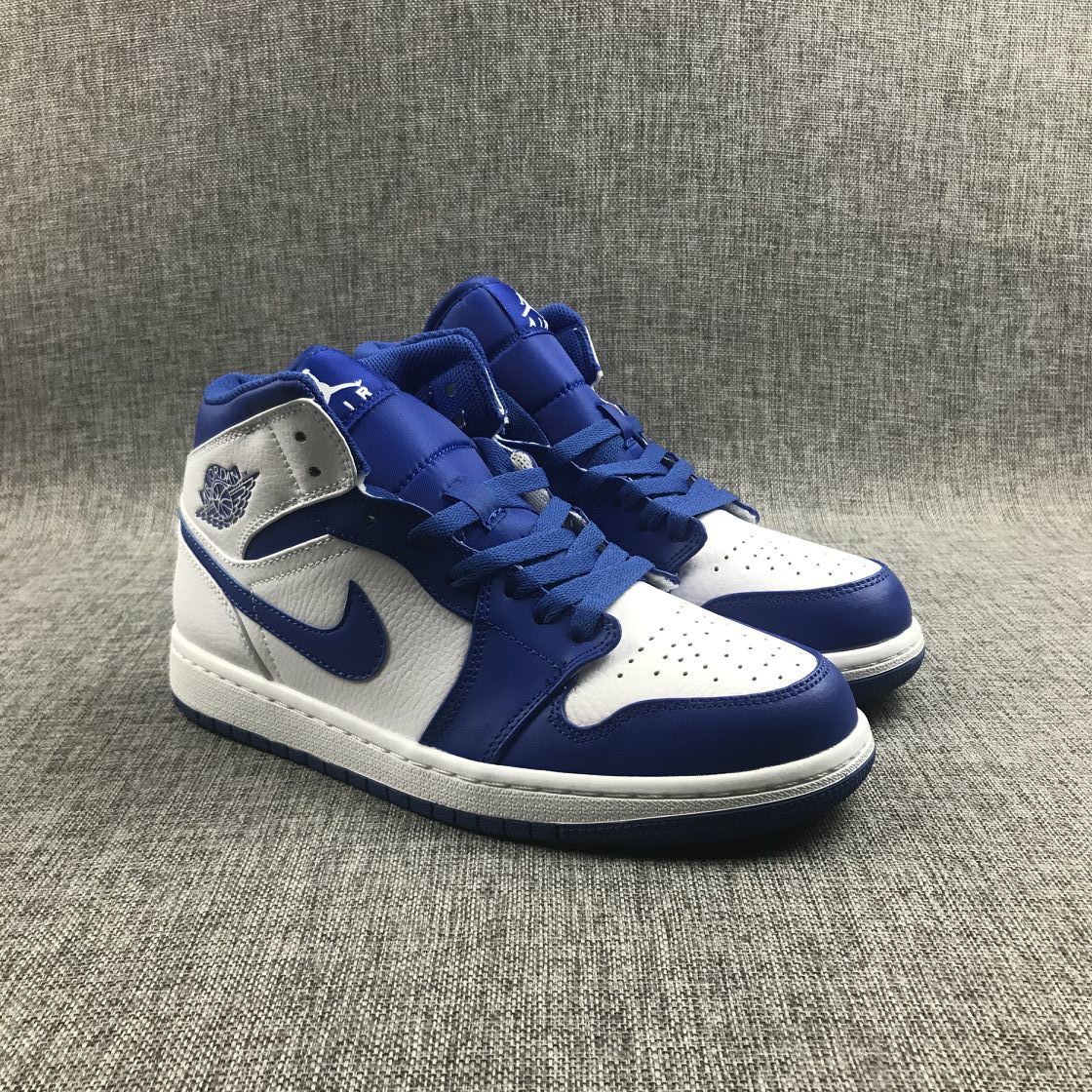 Hyper Royal Sneakers, White and Blue, - Jordan 1 Mid 554724-114 - product image from the listing.