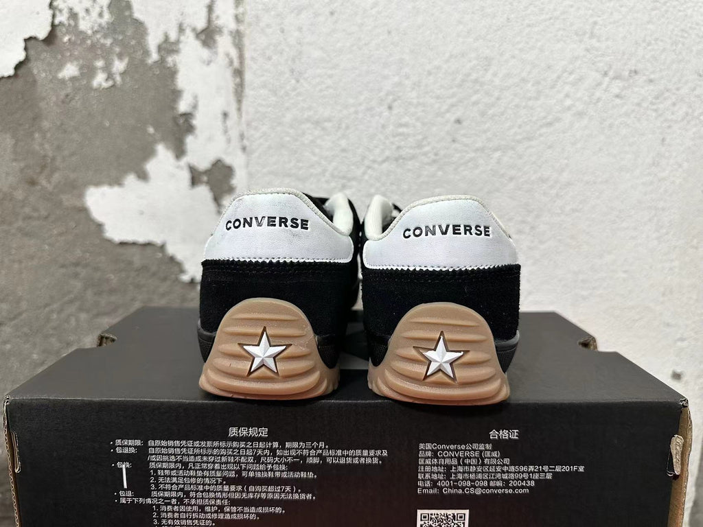 Black and White Converse Trainer-Style Sneakers - product image from the listing.