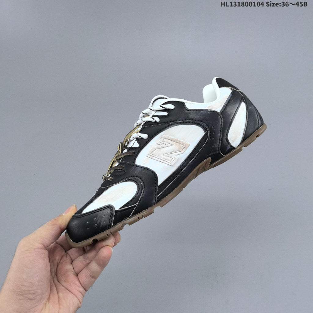 Black and White New Balance 530 SL Low-Top Sneakers - product image from the listing.