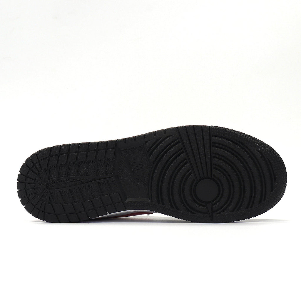 Jordan 1 Low Sneakers in Black Pink White 554723-106 - product image from the listing.