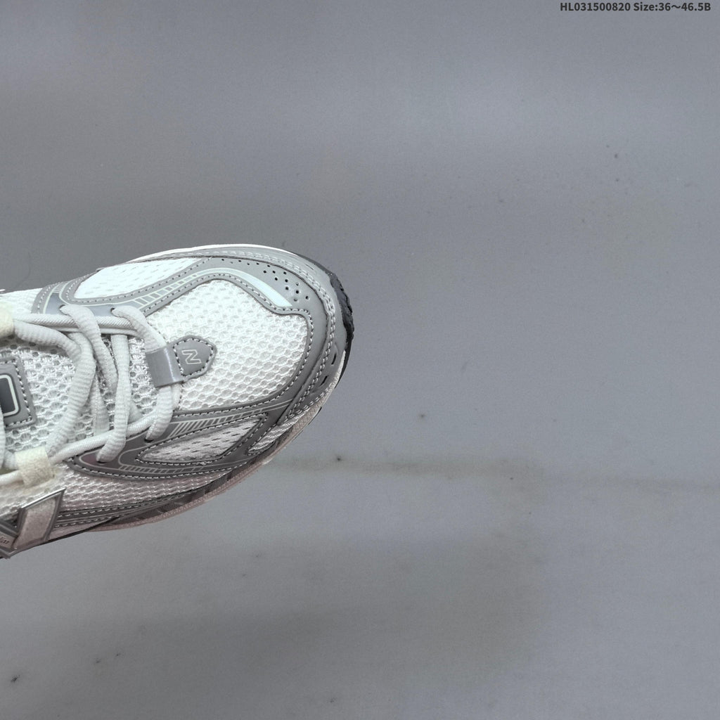 New Balance 1906R Sneakers in White Silver U1906RJM - product image from the listing.