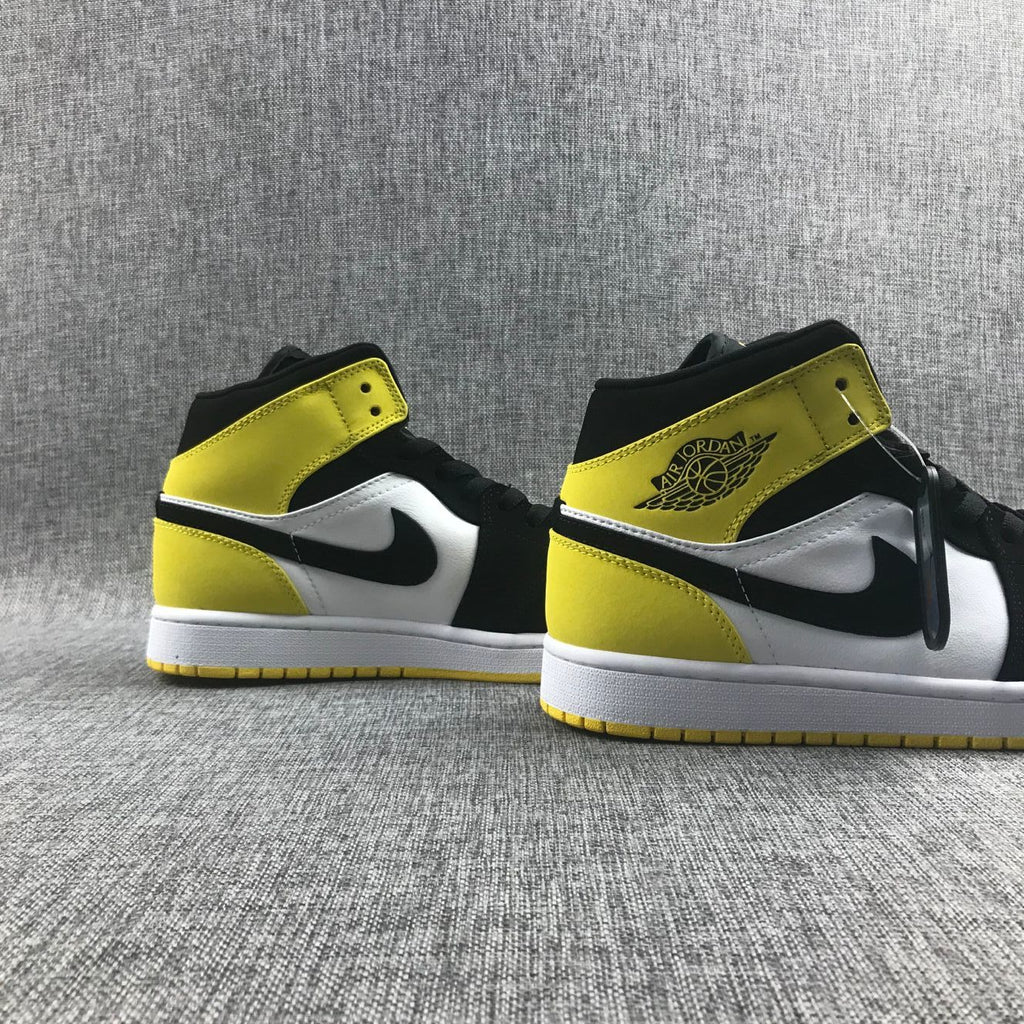 Black Yellow Toe Sneakers - Air Jordan 1 Mid SE 852542-071 - product image from the listing.