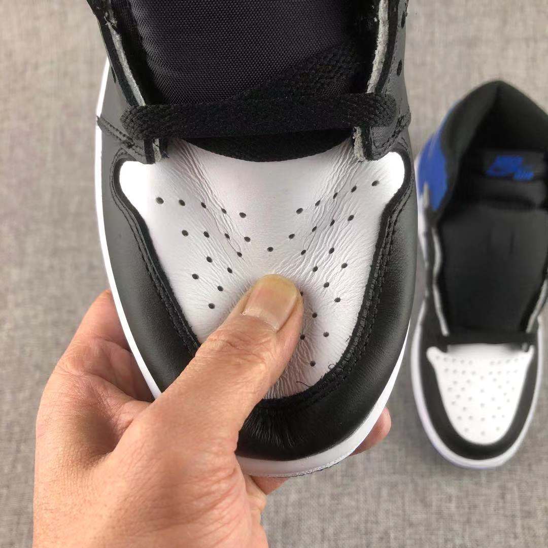 Jordan 1 Retro Fragment Sneakers in Black White Blue 716371-040 - product image from the listing.