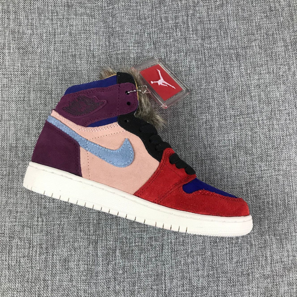 Jordan 1 High Christmas Sneakers in Red Multicolor - product image from the listing.