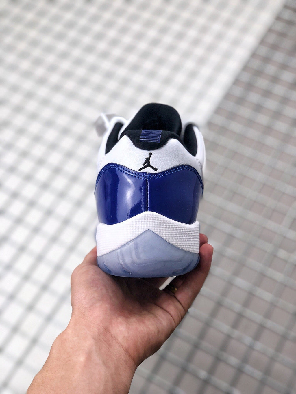 Air Jordan 11 Sneakers in White and Deep Blue BQ3685-001 - product image from the listing.
