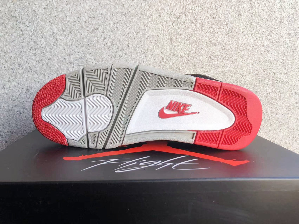 Air Jordan 4 Black Grey Red Sneakers - product image from the listing.