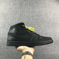 Air Jordan 1 Mid Sneakers, in Black - product image from the listing.